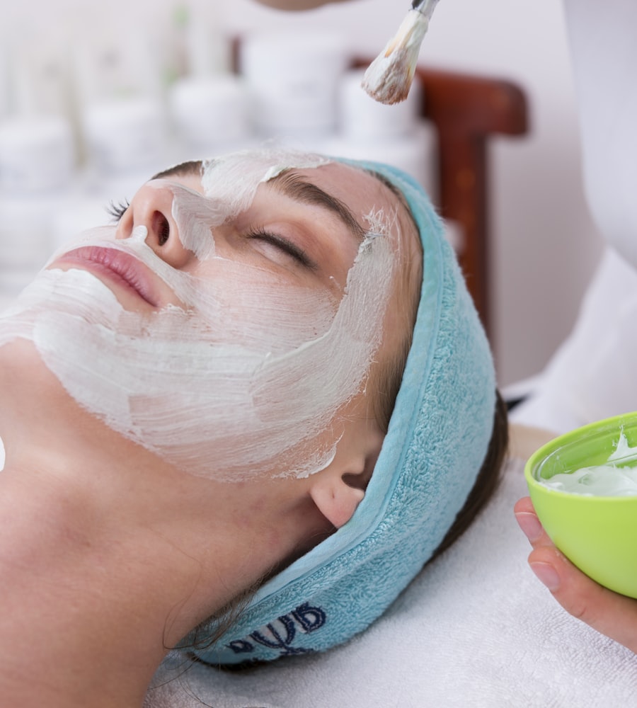 Woman relaxing with a natural clay face mask