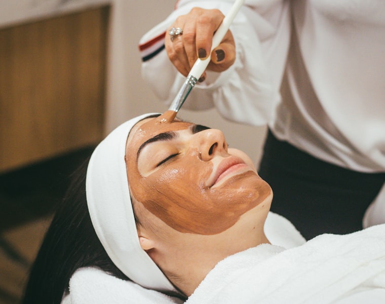 Woman enjoying a relaxing facial treatment